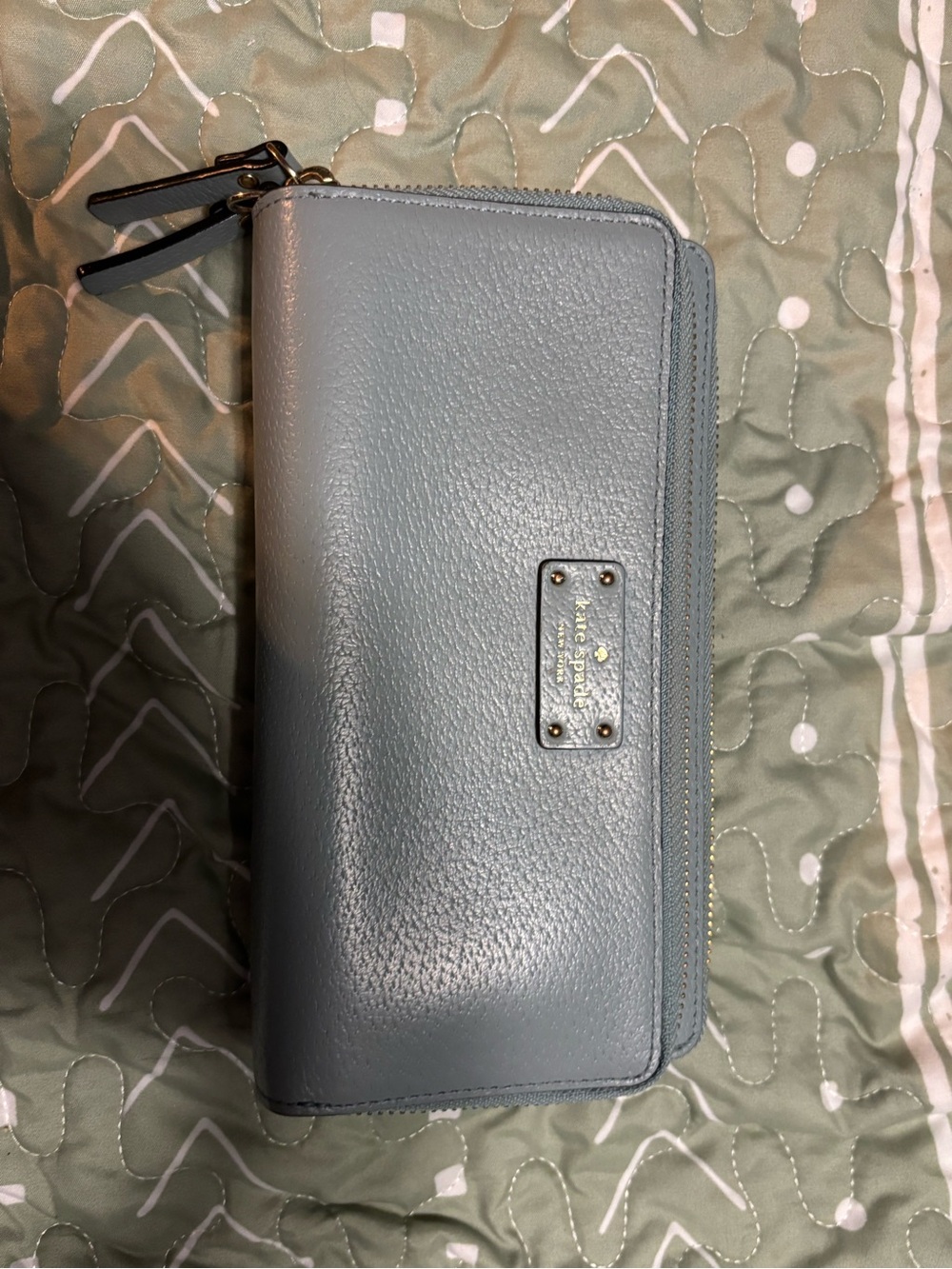kate spade light blue pebbled leather zip wallet with gold plaque